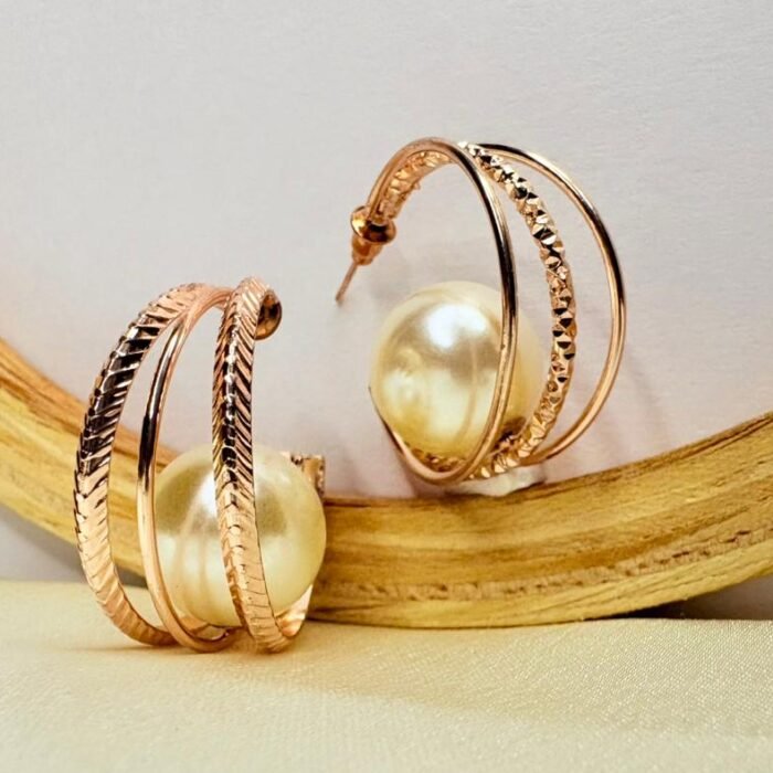 Gold pearl hoop earring
